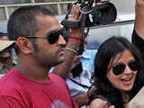Dhoni and his wife Sakshi at the Kolkata airport