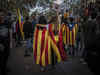 Catalan separatists jailed as warrant sought for Carles Puigdemont
