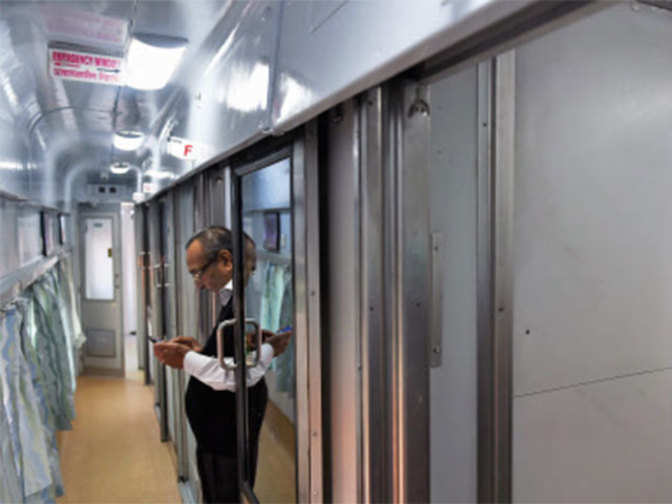 Indian Railways unveils new Swarna Rajdhani coaches get an upgrade of Rs 35 lakh, now have CCTV, Odorless toilets, Led lighting over mirrors and mats for bathroom doors among others - Economic Times