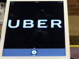 Uber’s losses widen as SoftBank launches bid to buy shares