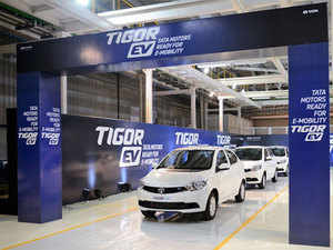 Ratan Tata and N Chandrasekaran roll out the first batch of Tata Tigor EVs from Sanand factory