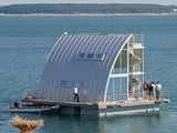 Floating house on Geierswalder See lake in Germany