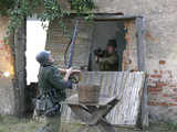 Enthusiasts re-enact a World War II battle scene