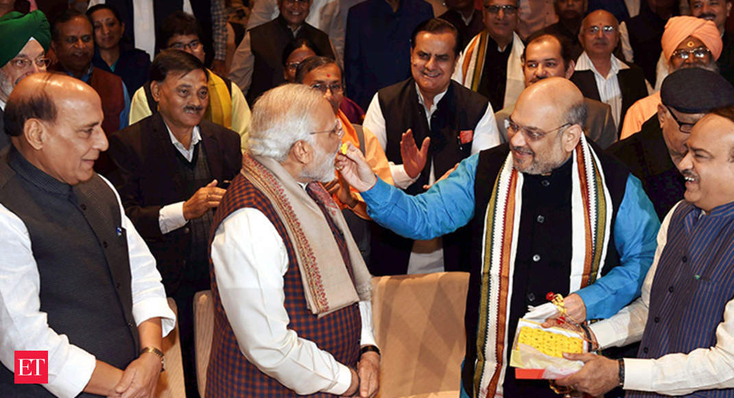 Modi: BJP's twin victory: PM Modi gets rousing welcome in parliamentary ...