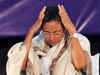 Mamata Banerjee changes tack, prays to contain BJP