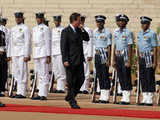 David Cameron inspects a guard of honor