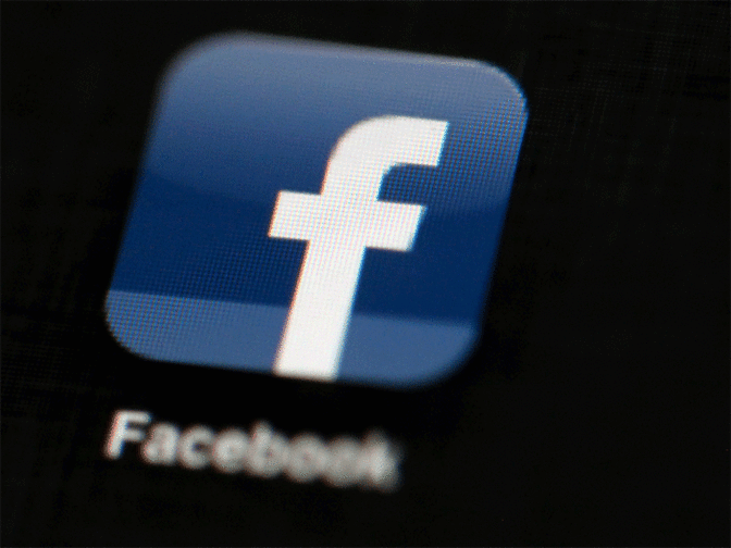 Facebook changes News Feed, investors click on 'sad'