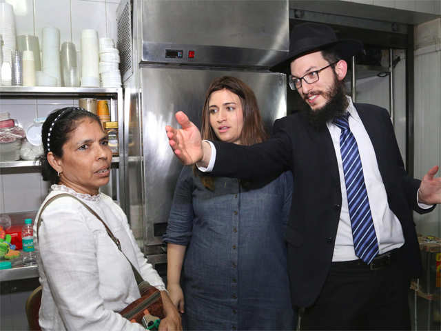 ​Rabbi Yisroel Kozlovsky with the maid