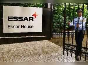 Mumbai: A security personnel stands guard at the Essar House in Mumbai on Monday...