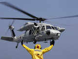 Dokdo signals to a UH-60 helicopter