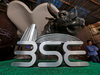 Sensex, Nifty hit fresh record high after tepid start; USL plunges 6%