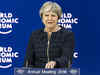 Davos rhetoric on free trade not often matched by action: Theresa May