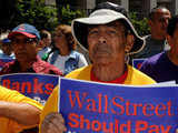 Protesters hold up signs in Los Angeles