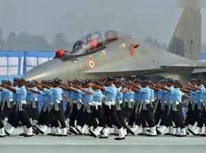 Ghaziabad: Indian Air Force personnel near Sukhoi-30 MKI fighter plane take part...