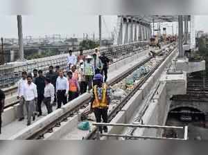 Secunderabad: Municipal Minister KT Rama Rao interacting with workers of L&T Met...