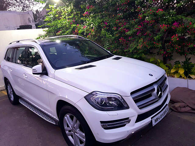 Mercedes Benz GL 350 CDI and a Mercedes Benz C Class sedan