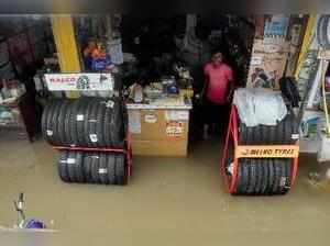 Nagpur: A waterlogged tyre shop at a market after heavy rains in Nagpur, Maharas...
