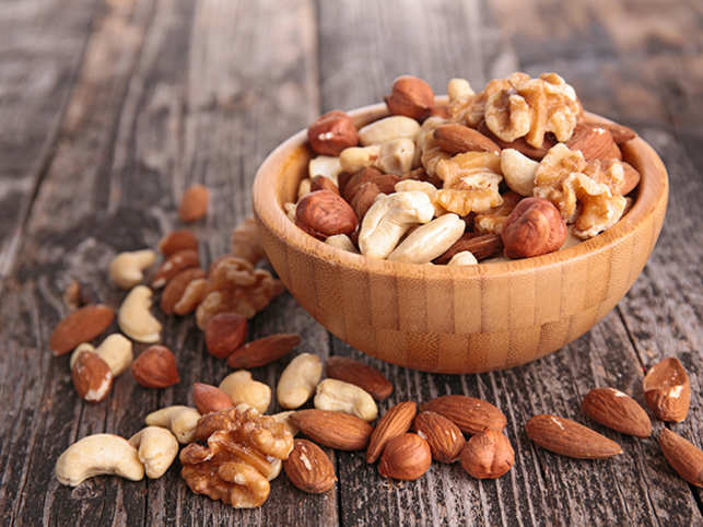 Include almonds, walnuts in your diet to ward off colon cancer ...