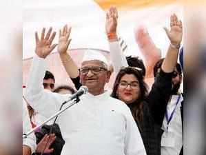 Jammu: Social activist Anna Hazare waves during a public meeting at Dussehra Gro...