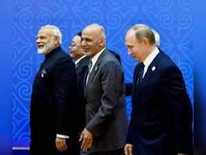 Astana: Prime Minister Narendra Modi with Afghan president Ashraf Ghani and the ...