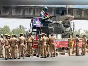 Chennai: Police personnel guard the statue of rationalist leader E V Ramasamy, p...