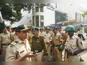 Mumbai: Police personnel deployed at Bhaidas Hall at Vile Parle in Mumbai on Thu...