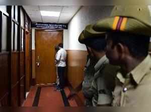 Bengaluru: Police personnel stand guard outside the chamber of Karnataka Lokayuk...