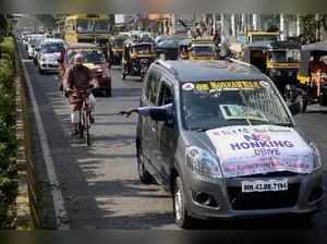 Navi Mumbai: Cars with banners 'No Honking Drive' seen during an awareness rally...