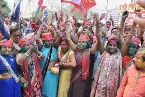 Gorakhpur: Samajwadi Party member celebrate the success of their party in the Lo...