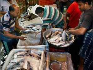 Kolkata: Customers buy Ilish, or Hilsa fish in large quantities at a fish market...