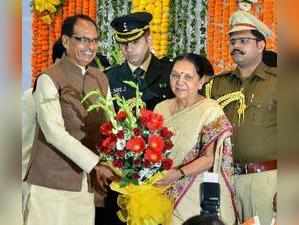 Bhopal: Newly appointed Governor of Madhya Pradesh Anandiben Patel being greeted...