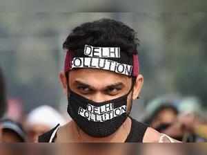 New Delhi: A participant highlights the issue of air pollution during the Airtel...