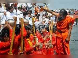 Haridwar: Yoga guru Baba Ramdev performs a ritual to give 'deeksha' to 88 religi...