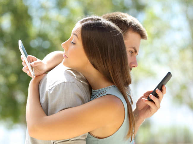 Do you unknowingly ignore people when using your phone? 'Phubbing' can ruin relationships