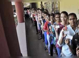 New Delhi: Students queue up to cast their votes for the Delhi University Studen...