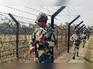 Dharmanagar: Border Security Force (BSF) personnel patrol along the India-Bangla...