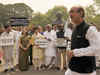 Opposition holds dharna over deadlock, govt blames Gandhis for disruption