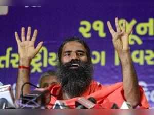 Ahmedabad: Yoga Guru Baba Ramdev addressing a press conference ahead of Interna...