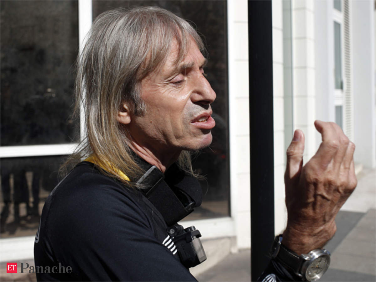 How Alain Robert aka French Spiderman climbed Paris's 4th-tallest building  with climbing shoes & chalk - The Economic Times