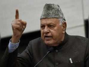 New Delhi: National Conference President Farooq Abdullah addresses during an eve...