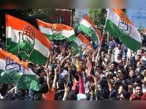 Ahmedabad: Congress party supporters celebrate after a party candidate's win in ...