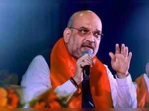 Bengaluru: BJP National President Amit Shah speaks during an interactive meeting...