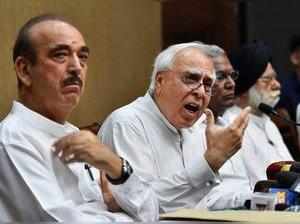 New Delhi: Congress leader Kapil Sibal addresses a press conference after opposi...