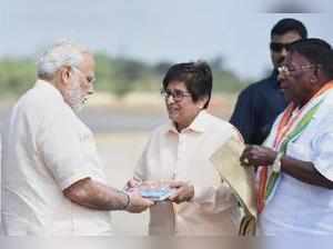 Puducherry:Prime Minister, Narendra Modi being received by the Lieutenant Gover...