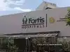 Race for Fortis: Hero's SK Munjal and Dabur's Burmans revise bid, offer Rs 1,800 crore to sweeten deal