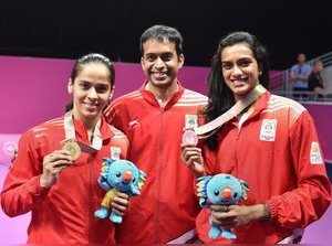 Gold Coast: Women's singles badminton Gold medalist Saina Nehwal and silver meda...