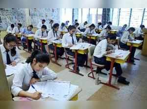 Gurugram: Students write their CBSE board exams, in Gurugram on Monday. PTI Phot...