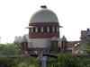 Supreme Court sets up panel to auction Unitech's properties