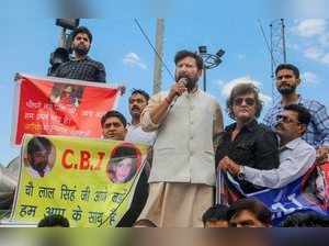 Jammu: Former BJP minister Choudhary Lal Singh leads a protest rally in support ...