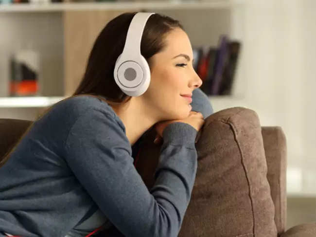 Like listening to. Listening to Music at Home with Bluetooth Headset. Modern Music and after.